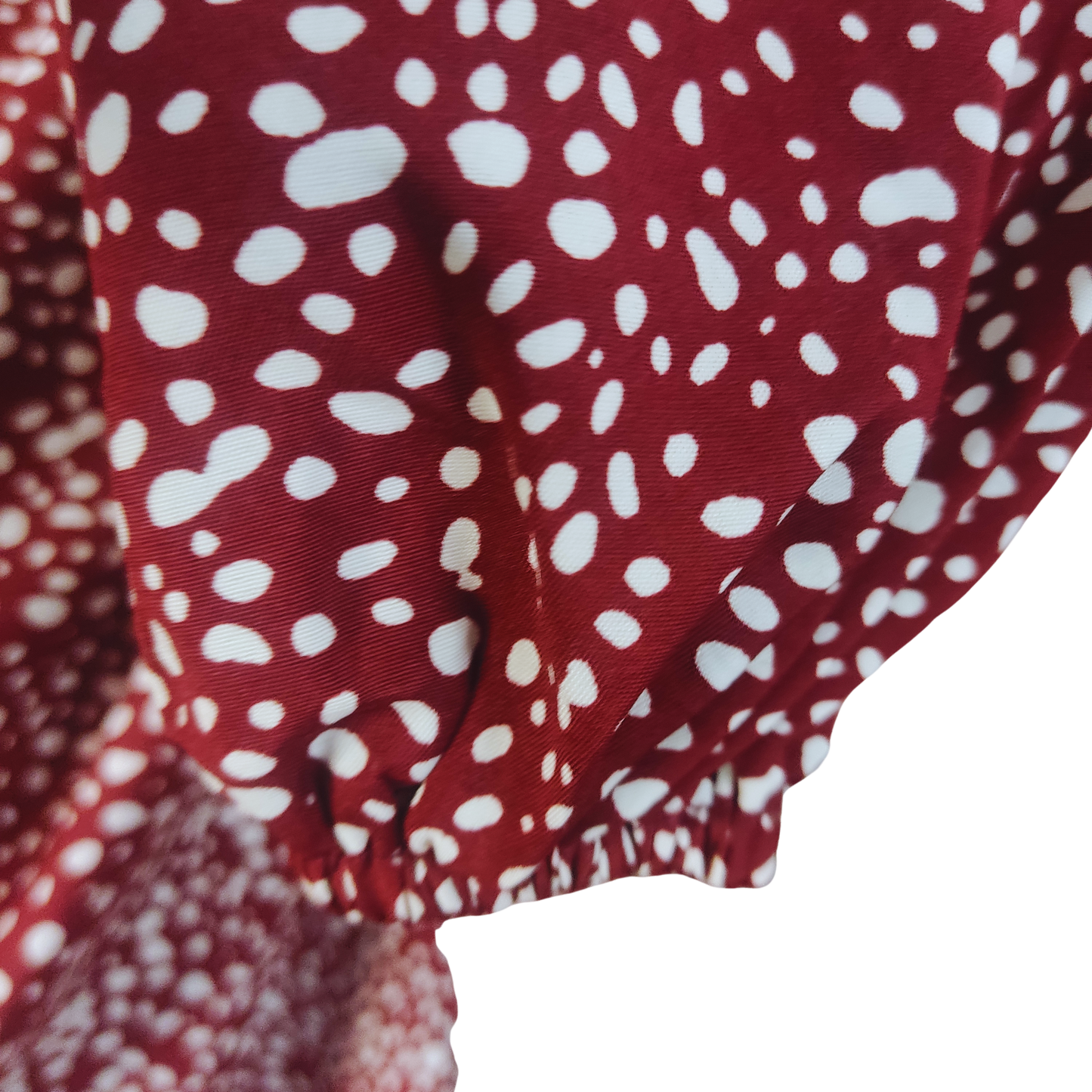 Blusa color burdeo oscuro con puntos blancos irregulares cod. 4000026